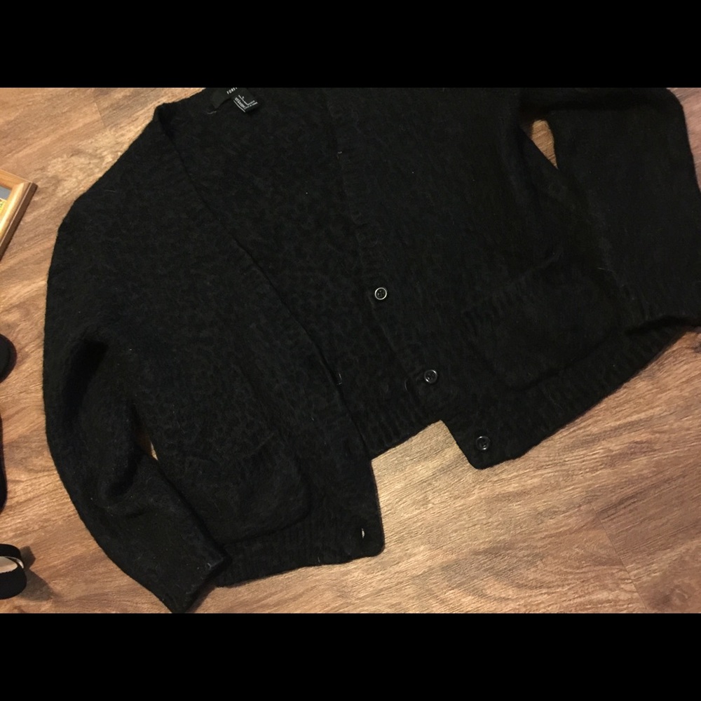 Black cardigan sweatshirt.